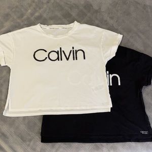 Two Calvin Klein cropped body t-shirts